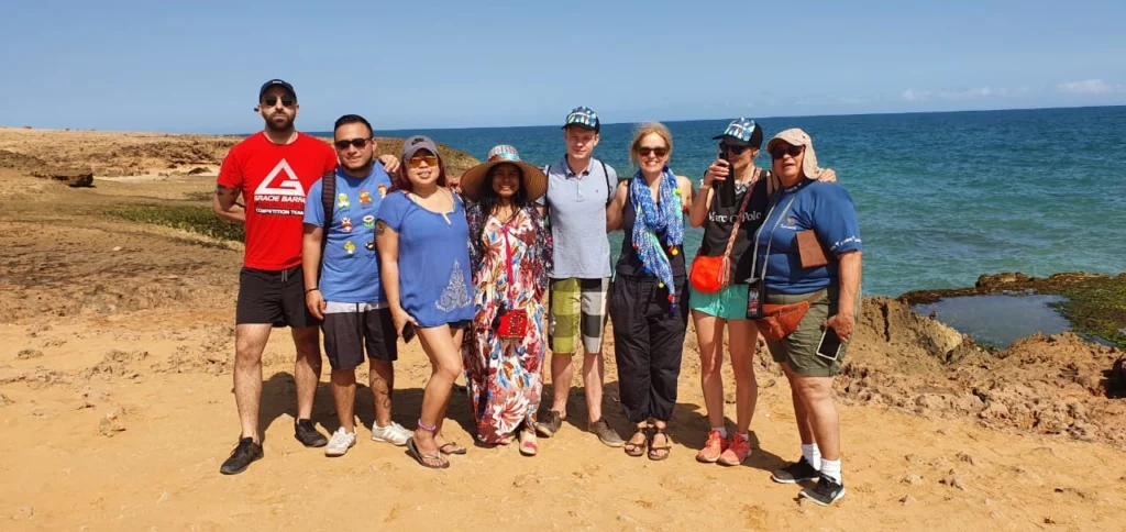 Tourist in the Guajira region taking a photo near the beach and the caribean sea